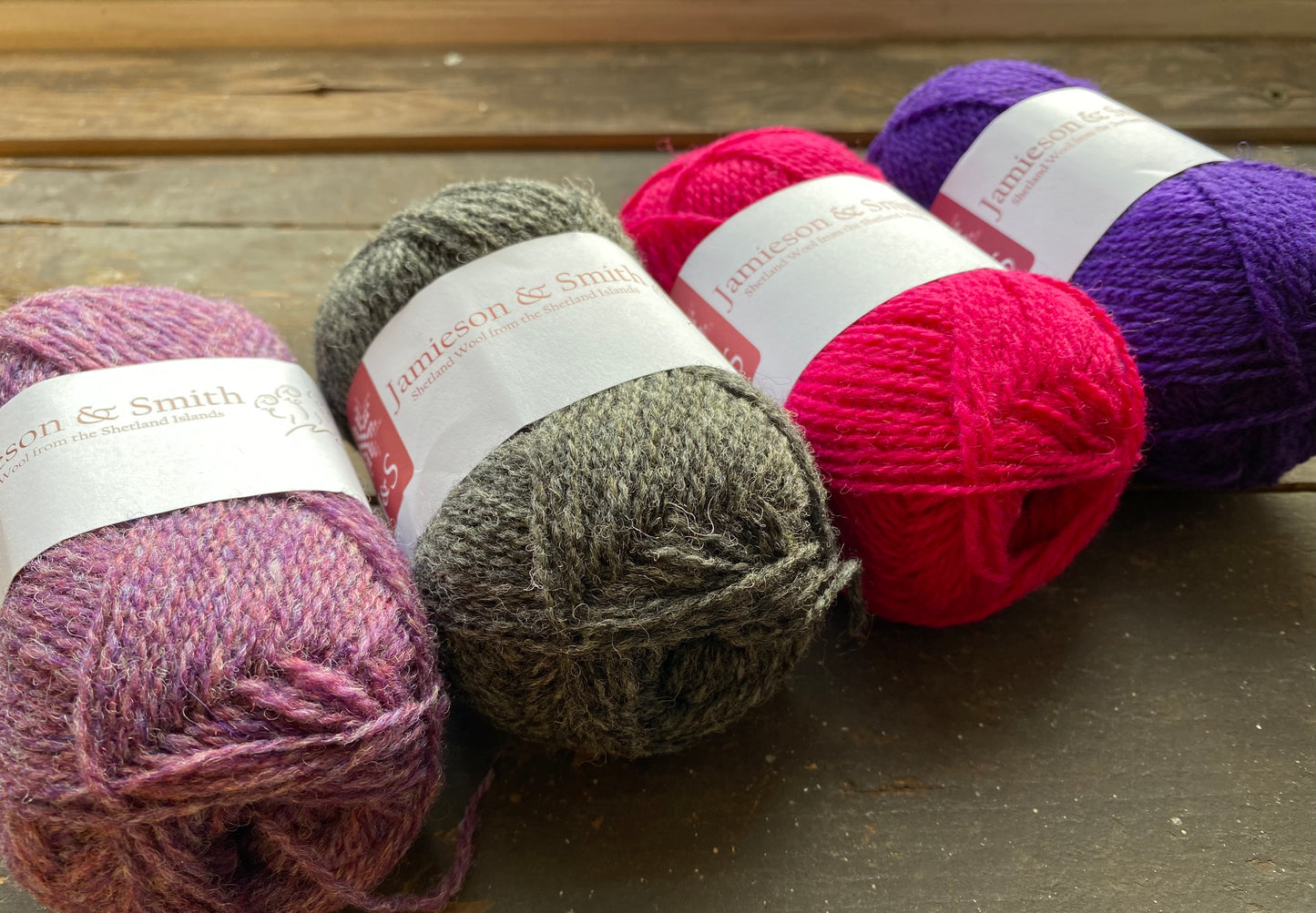 Five Round Weaving Looms with four 25g Jamieson & Smith Shetland Wool