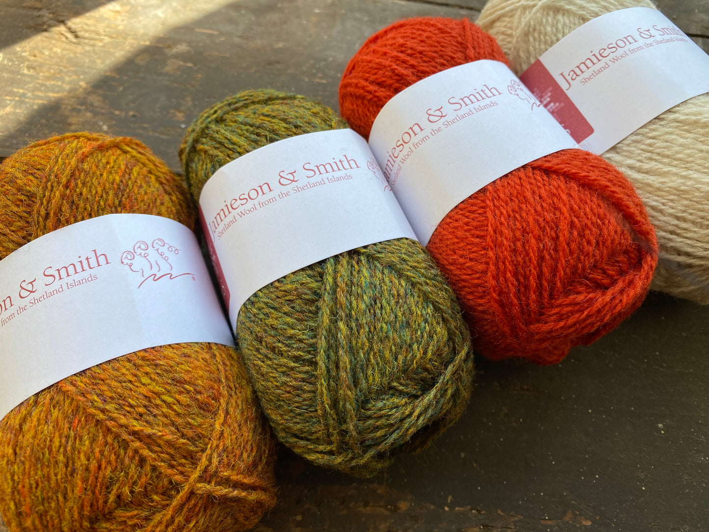 Five Round Weaving Looms with four 25g Jamieson & Smith Shetland Wool