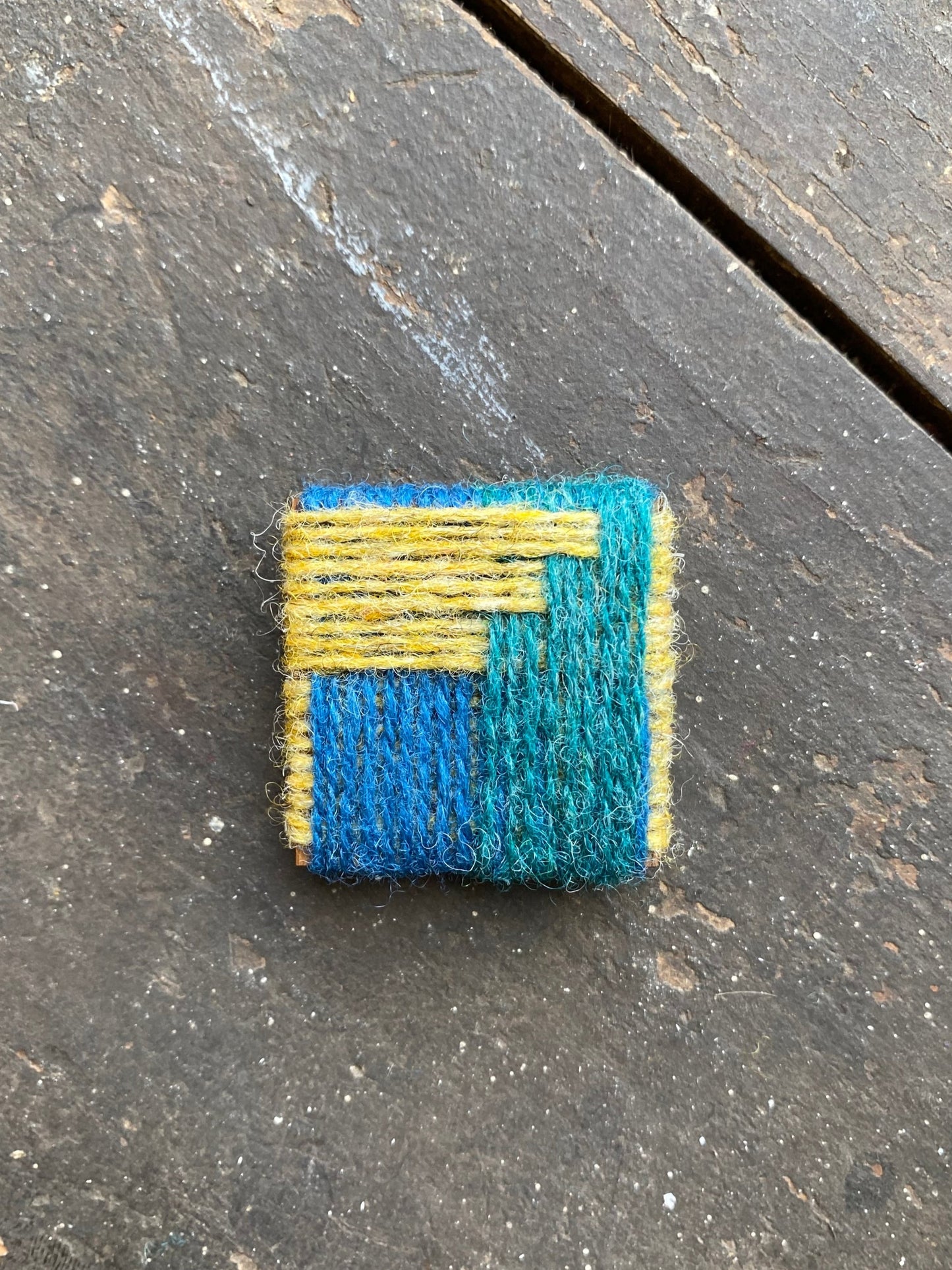 Wrap weaving brooch